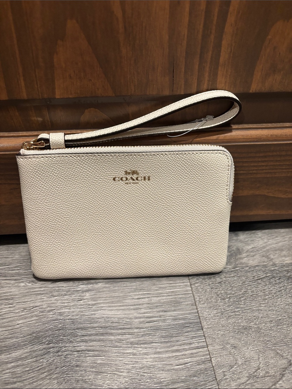 COACH Cream Pebbled Leather Wristlet Clutch with Gold Logo